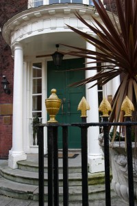 Columns on a fluted door canopy.