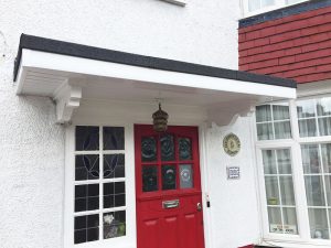 Replacement door canopy in Golders Green
