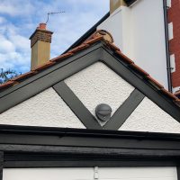 Black bargeboards design on garage