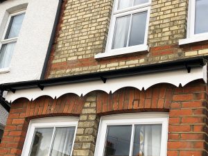 White scalloped fascia boards