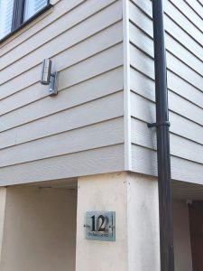 Modern grey cladding with new guttering