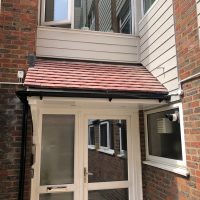 Door canopy installation in Enfield