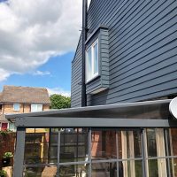 Grey weatherproof cladding installation