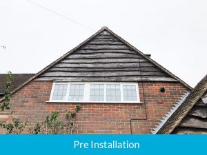 Distorted waney-edge timber cladding