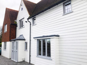 Replacement cladding in Harlow