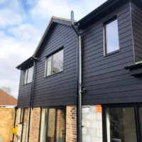 Black composite cladding installation