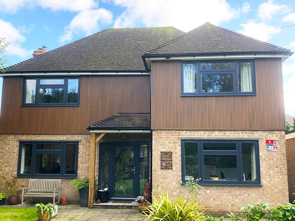 Ecoscape ‘spiced oak’ slatted cladding installation in Caterham, Surrey