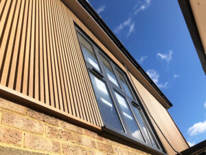Ecoscape spiced oak cladding in surrey