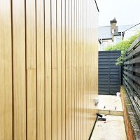 Timber cladding installed on the side of house
