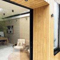 Replacement timber cladding around rear glass doors