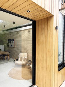 Replacement timber cladding around rear glass doors