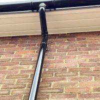 New black UPVC guttering installation