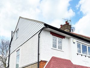 White composite cladding installation in East London