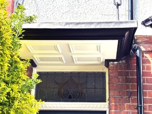 White mouldings on bespoke door canopy
