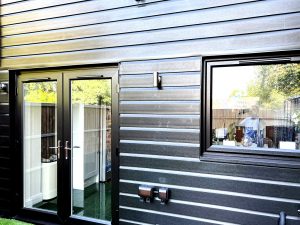 Black PVC Shiplap cladding at rear of property