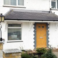Door canopy installation in Muswell Hill with tiled roof